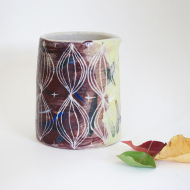 Brushstroke carved pitcher