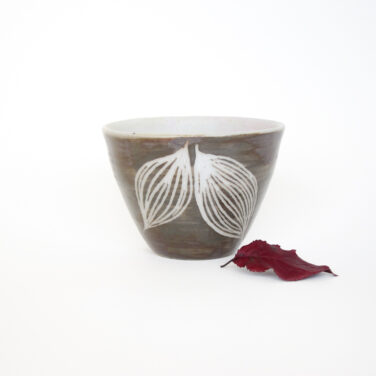 Leafy tea cup dark